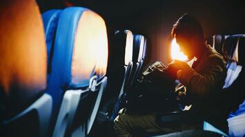 Passenger of the plane preparing for the long flight
