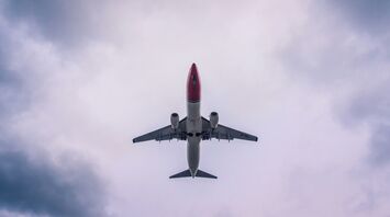 Norwegian Air airplane flying in the sky