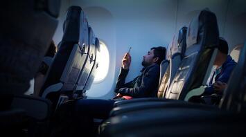 Passenger in the airplane during the flight