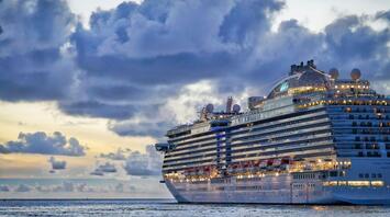 Sparkling cruise ship on the sunset