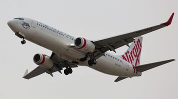 Virgin Australia aircraft landing at Sydney Airport