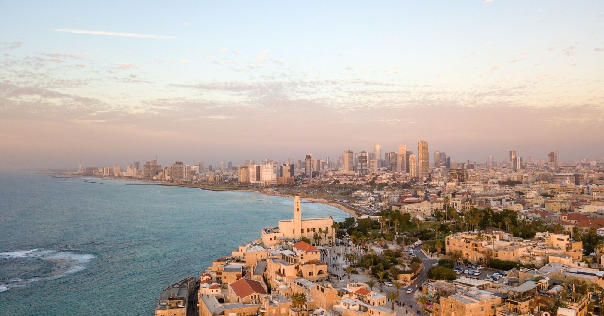 Aerial view of Tel Aviv's coastline at sunset
