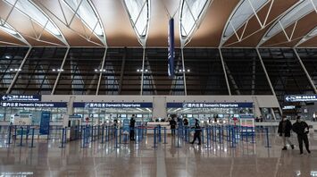 people walking inside airport building during daytime
