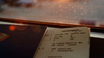 Airline ticket with sunset view