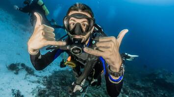 Divers in the transparent turquoise water