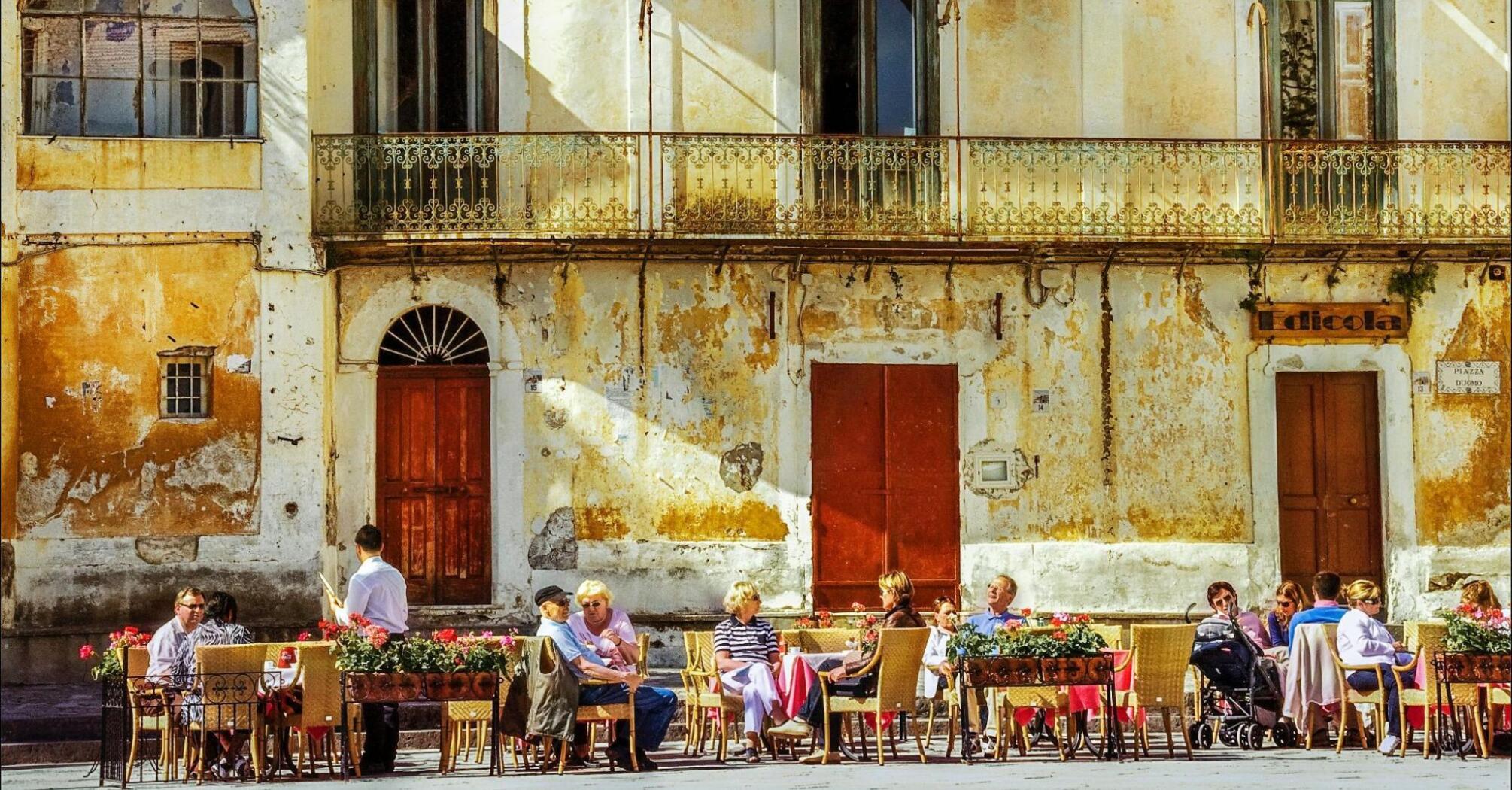 Tourists spending sunday in the traditional restaurant on Amalfi Coast