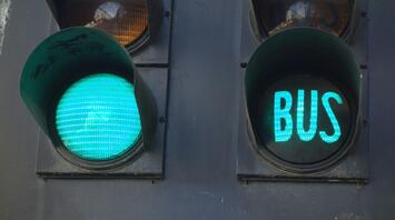 Traffic light with a green signal and a bus signal