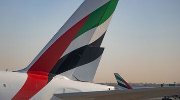 Emirates airline planes on the runway at Dubai airport