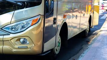 Close-up view of a modern bus in sunlight