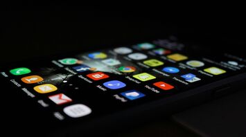 Smartphone displaying various app icons