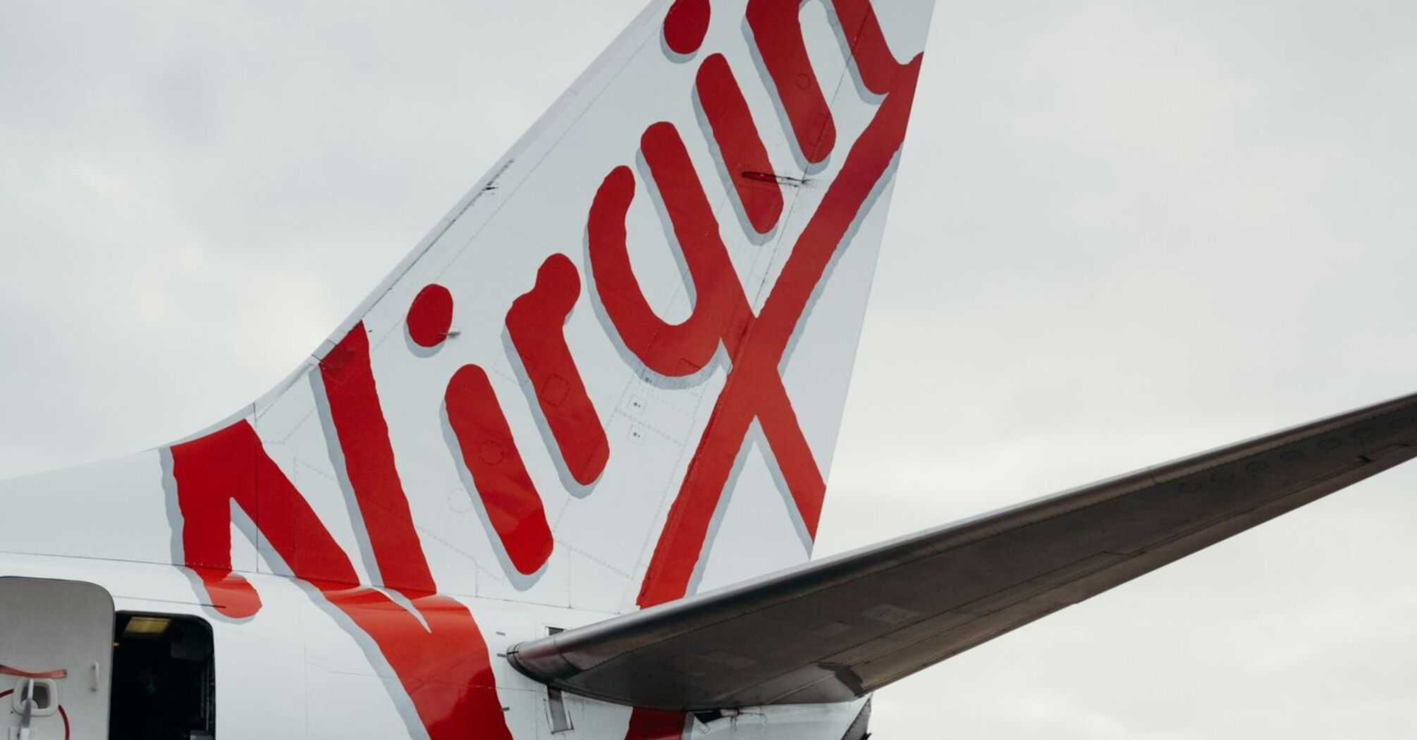 Virgin Australia airplane tail on the tarmac