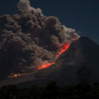 Mount erupting with ash clouds and lava flow