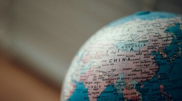 Close-up of a globe showing China and surrounding countries