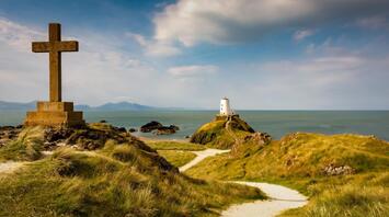 Lighthouse in Anglesey next to the Newborough Beach