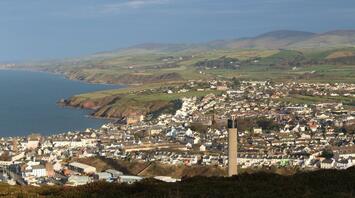 Aerial view of a coastal town on the Isle of Ma