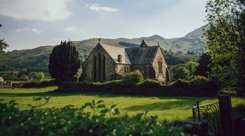brown house near trees during daytime