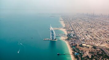 Aerial view of Dubai coastline and Burj Al Arab