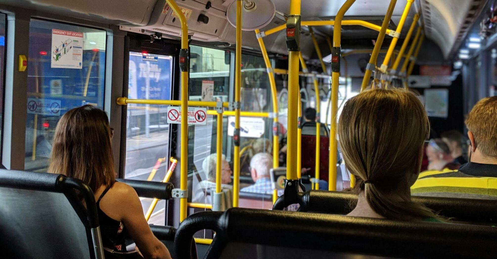 Passengers sitting inside a city bus in Nottingham
