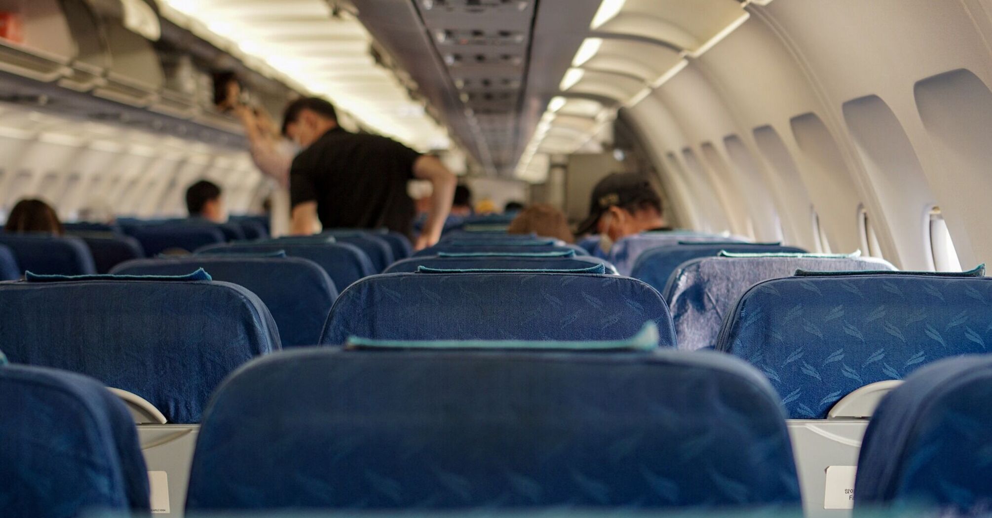 Passengers board an airline flight