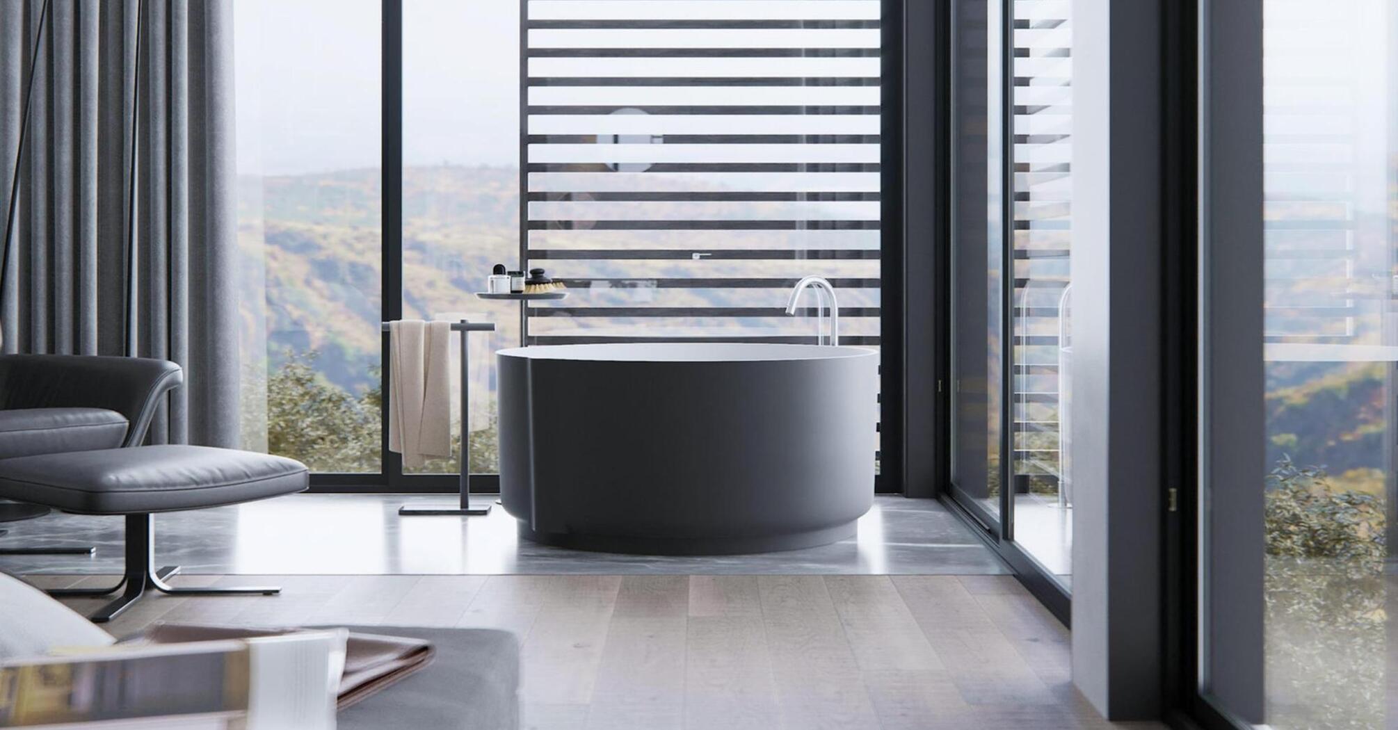 Modern bathroom with panoramic windows and views of the Scottish landscape