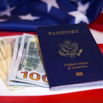 Open passport with various stamps