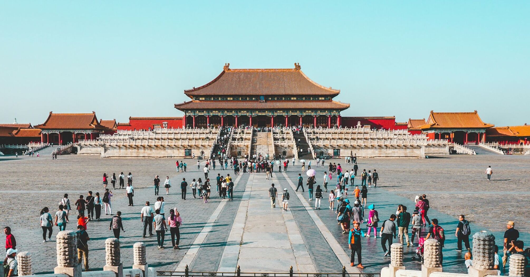 Tourists visiting a historic Forbidden City in China