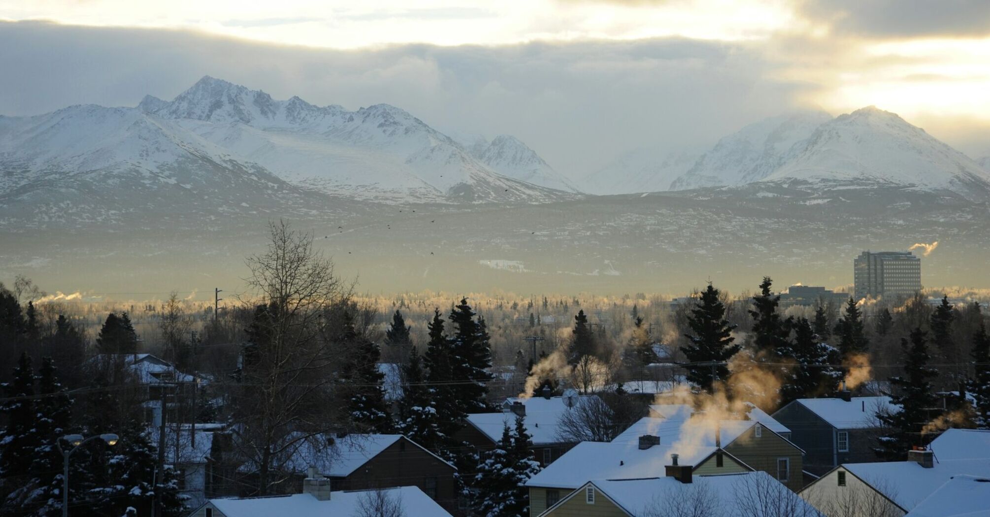 Anchorage with snowy mountains in the background