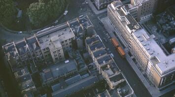 Aerial view of a London street with buses and buildings