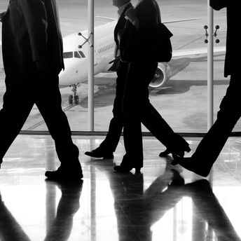 People walking in an airport terminal