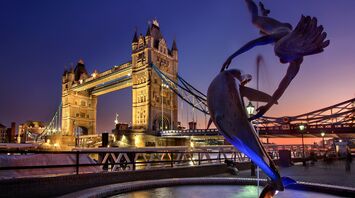 Tower Bridge and the Dolphin Fountain at dusk