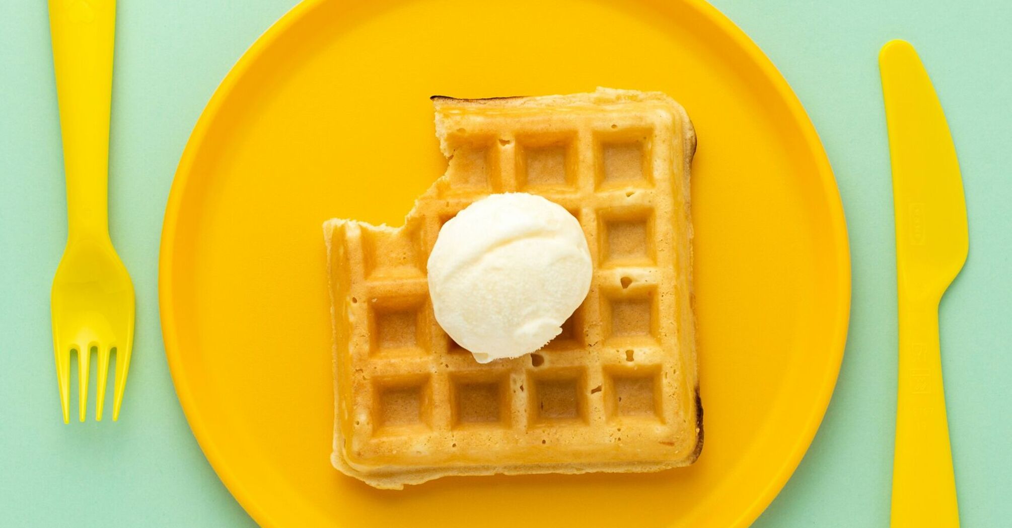 food photography of waffles with vanilla ice cream on top