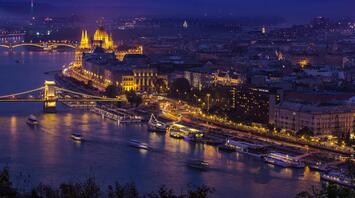 Night view of illuminated Parliament in Budapest and the Danube River