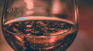 clear wine glass with clear liquid