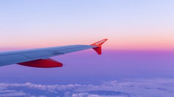 easyJet airplane wing during sunset