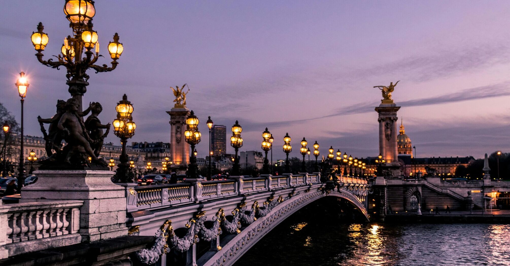 Parisian bridge during night time
