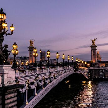 Parisian bridge during night time