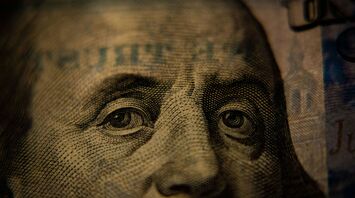 A closeup of a US hundred dollar bill (Benjamin Franklin side)