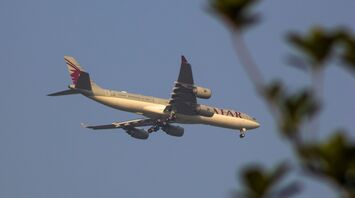 Qatar Airways airplane in flight