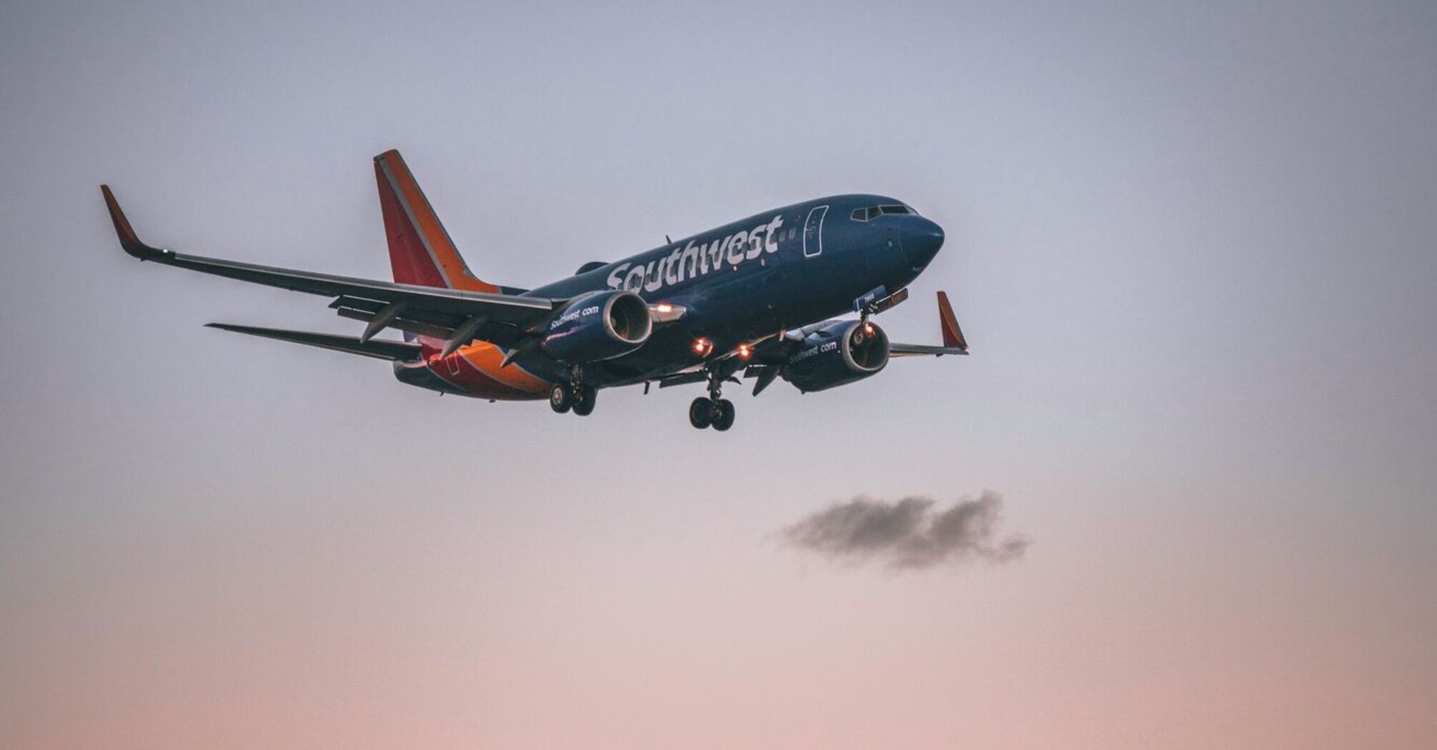 Southwest Airlines Boeing 737 landing at sunset