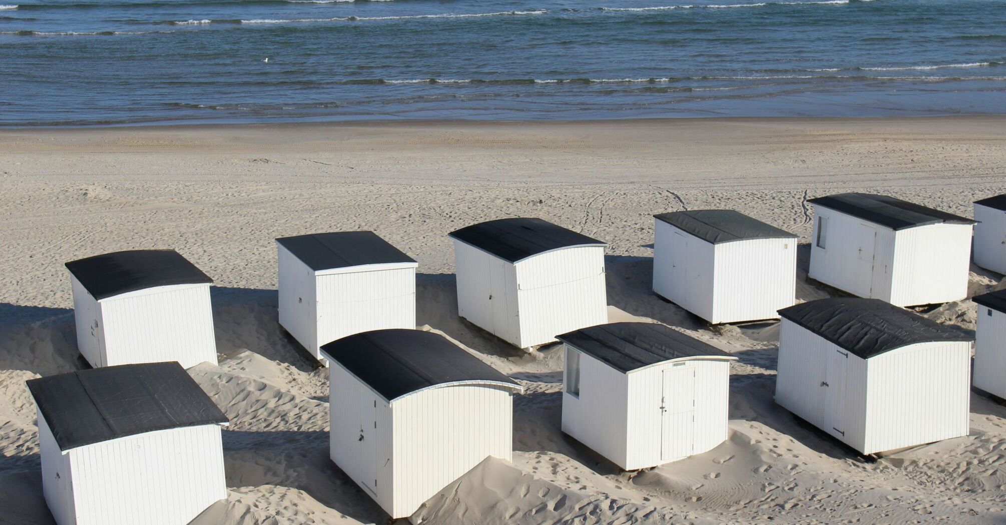 Beach huts on the beach of Lokken, Northern Jutland, Denmark, Scandinavia, Europe