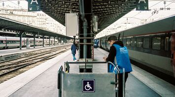 Platform at a French railway station with an SNCF employee