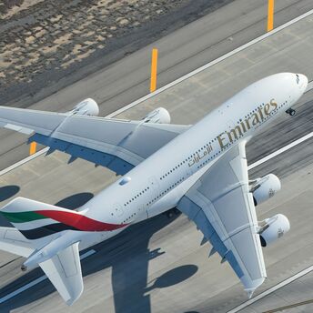 Emirates plane taking off from runway