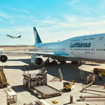 a large airplane is parked at an airport