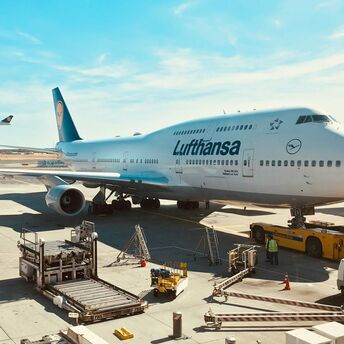 a large airplane is parked at an airport