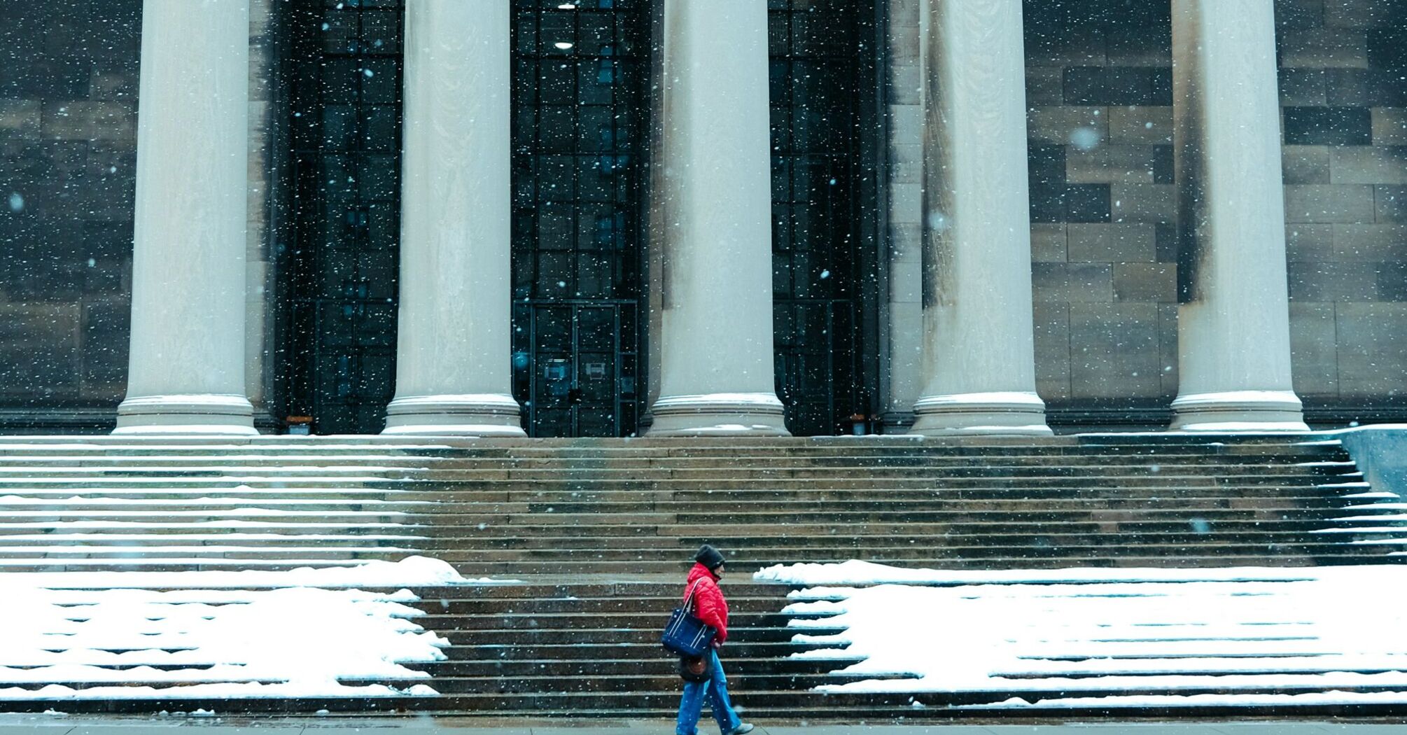 The Mellon Institute and a passerby on a snowy day