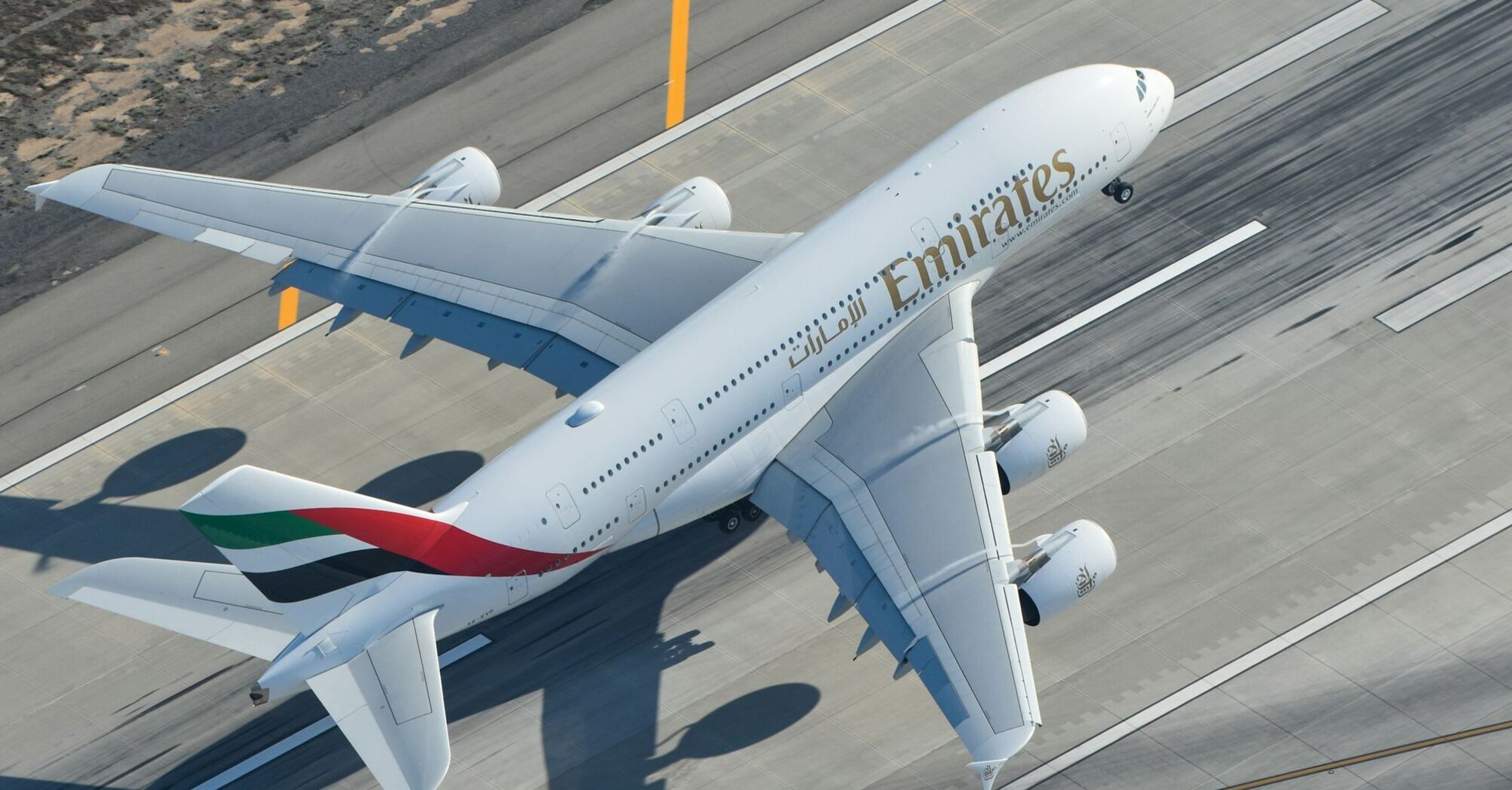 Emirates airplane taking off from the runway