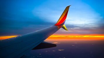 Southwest Airlines airplane wing during sunset