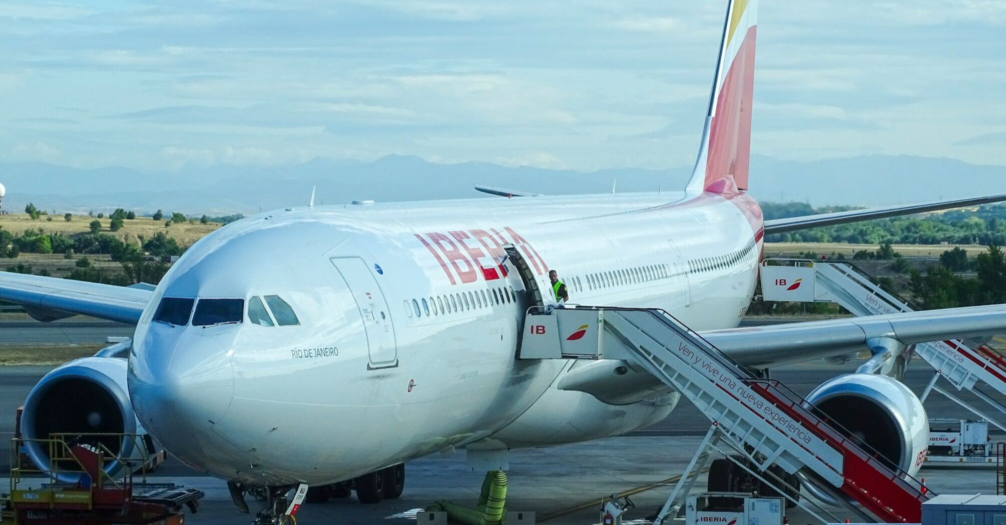 Iberia aircraft at the airport gate