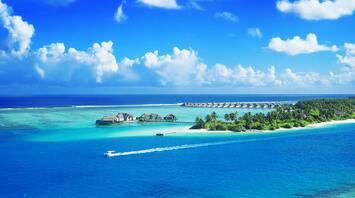 Aerial view of Maldivian atolls and resort