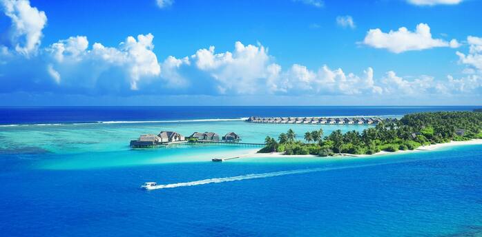Aerial view of Maldivian atolls and resort